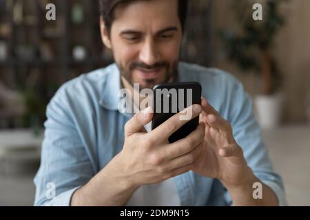 Close up of man using modern smartphone gadget Stock Photo