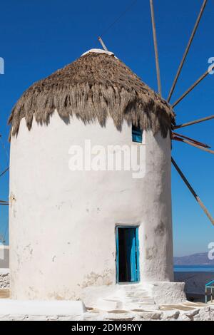 Windmill with opened blue entrance door, Mykonos Town, Mykonos Island, Greece Stock Photo