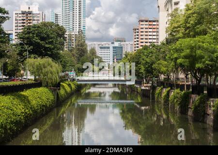 Outdoor landscaping design with creepers plants growth along a canal to beautify further, canal width and depth alleviate flooding purpose Singapore Stock Photo