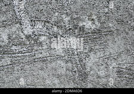 Old concrete grunge grey textured striped wall. Stock Photo