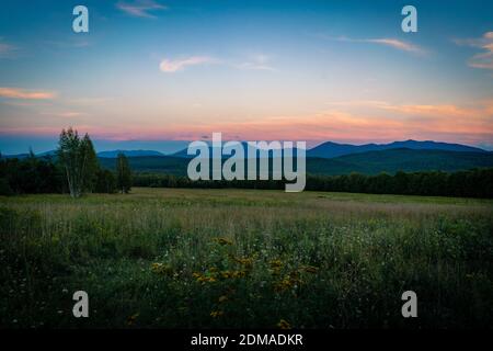 SARANAC LAKE, UNITED STATES - Sep 06, 2020: The sun sets over the Adirondack Mountains near Saranac Lake, New York Stock Photo