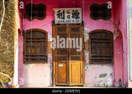 January 10, 2020 -  Alor Setar, Kedah, Malaysia: Close up detail of an old folding shutter gate in the front of a Perenakan shophouse in the city of A Stock Photo
