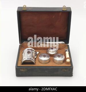 https://l450v.alamy.com/450v/2dmfxac/traveling-necessaire-silver-ivory-stamped-leather-case-set-consisting-of-cylindrical-silver-coffeepot-with-straight-ivory-handle-projecting-from-side-circular-lid-with-ivory-knop-cylindrical-stand-burner-two-covered-cannisters-knife-2-spoons-all-in-a-retangular-fitted-leather-case-with-the-initials-bm-on-the-hinged-lid-france-late-19th-century-metalwork-decorative-arts-traveling-necessaire-2dmfxac.jpg