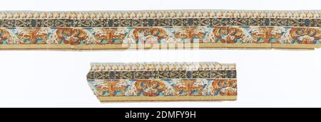 Border, Block-printed on handmade paper, This piece is probably one band of a border design originally printed in five or six bands, for the width of the wallcovering. Each band consists of four strips of varied patterns: the top strip forms a continuous dentilled 'fringe'; the center strip is the widest, containing an acanthus rinceau design. The bottom strip is a combination of what appears to be fleur-de-lis edged in a scalloped line; printed in blues, yellow, ochre, orange, tan, magenta, ecru, white and burnt sienna., H#614, France, 1795–1805, Wallcoverings, Border Stock Photo