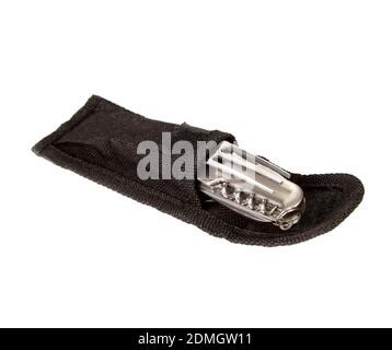 A multi-tool knife in a black case isolated on a white background Stock Photo