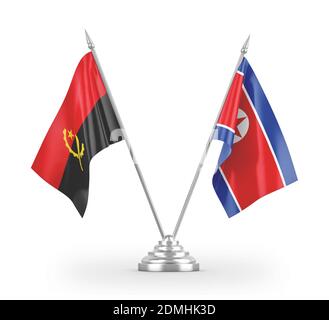 North Korea and Angola table flags isolated on white 3D rendering Stock Photo