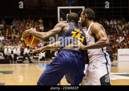 Serge Ibaka, player of Spain, drives the ball during the friendly match against Angola at the Municipal Palace of Sports of San Pablo on August 10, 2014 in Seville, Spain Stock Photo