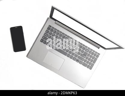 Laptop and frameless phone on a white background. Modern technological gadgets, white screens for copy space Stock Photo
