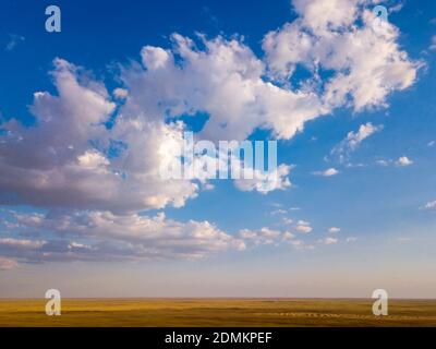 Blue sky and clouds with horizon on sunset. Stock Photo