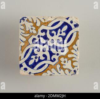 Tile, Glazed earthenware, Portion of a design composed of strap work and conventionalized foliage; painted in blue and brown., Netherlands, late 16th century, tiles, Decorative Arts, Tile Stock Photo