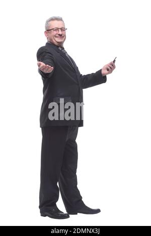 Side view man typing text message on his cellphone Stock Photo