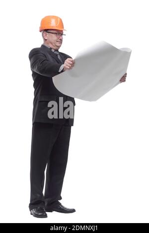 Confident architect wearing glasses looking at blueprints Stock Photo