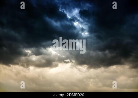 Dark and Dramatic Storm Clouds Area Background Stock Photo