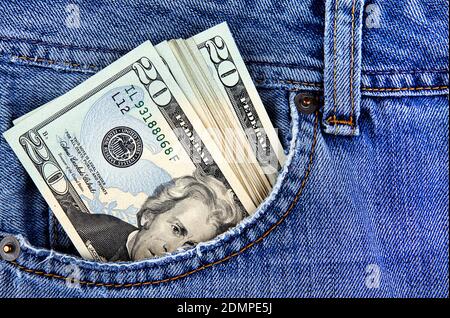 American Dollars in the Pocket of the Jeans closeup Stock Photo