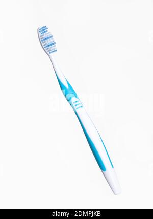 Plastic toothbrush On A white Background Stock Photo