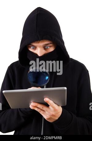 Surprised Hacker with a Tablet and Magnifying Glass Isolated on the White Background Stock Photo