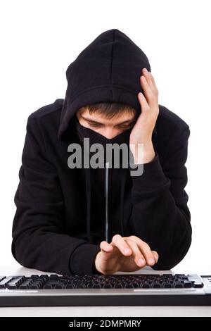 Troubled Hacker with a Computer Keyboard on the White Background Stock Photo