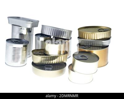 A pile of different types of cans with conserved vegetables, fish, and meat Stock Photo