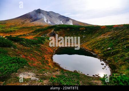 Mt. Asahi and Suribachi Pond, Hokkaido, Japan Stock Photo
