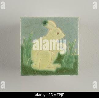 Tile, Grueby Faience Company, Revere, Massachusetts, 1895–1908, Grueby Pottery, 1899 – 1911, Glazed earthenware, Gray-white earthenware body with press-molded design of rabbit crouching in grass. Light blue light and dark green, and pale yellow-green mat glzes defined by raised partitions., ca. 1902, tiles, Decorative Arts, Tile Stock Photo