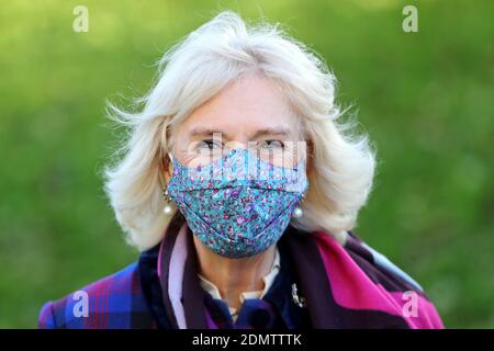 The Duchess of Cornwall wearing a face mask arrives to meet with front line health and care workers administering and receiving the Covid-19 vaccine during a visit to the Gloucestershire Vaccination Centre at Gloucestershire Royal Hospital. Stock Photo