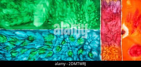 abstract colorful hand-painted cloth for scarf in batik technique with salt spots Stock Photo