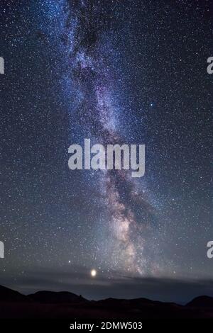 Jupiter and the Milky way galactic centre over the Isle of Harris, Scotland Stock Photo
