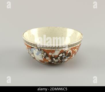 Bowl, Glazed earthenware, Circular with rounded sides. Outside mottled in dark brown, blue and white against lighter brown ground, suggesting composite stone. White band about top with black cross-hatching. Ring foot ground down., England, late 18th century, ceramics, Decorative Arts, Bowl Stock Photo