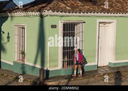 Student walking, Trinidad Cuba Stock Photo