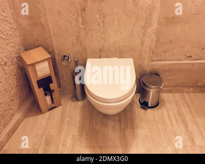 Modern toilet  with stone walls Stock Photo