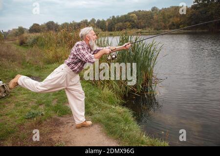 Full Length Shot Fisherman Big Carp Fish Fishing Rod Isolated — Stock Photo  © ljsphotography #238128436