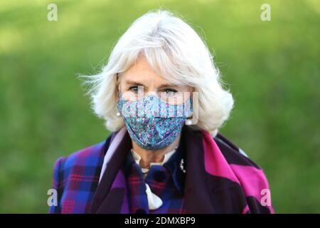The Duchess of Cornwall wearing a face mask arrives to meet with front line health and care workers administering and receiving the Covid-19 vaccine during a visit to the Gloucestershire Vaccination Centre at Gloucestershire Royal Hospital. Stock Photo