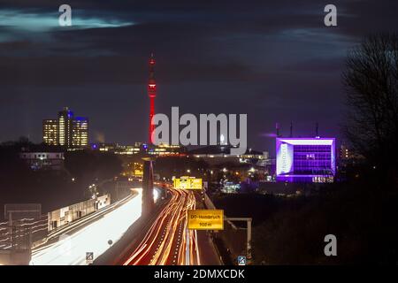 City panorama of Dortmund over motorway B1 with Florian tower, event hall Westfalenhalle and Inhouse in pink Stock Photo