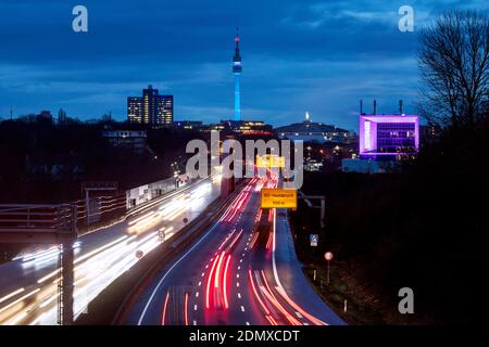 City panorama of Dortmund over motorway B1 with Florian tower, event hall Westfalenhalle and Inhouse in pink Stock Photo