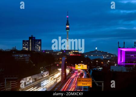 City panorama of Dortmund over motorway B1 with Florian tower, event hall Westfalenhalle and Inhouse in pink Stock Photo