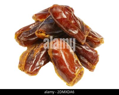 Close up of dried organic dates isolated on white background, selective focus. Stock Photo