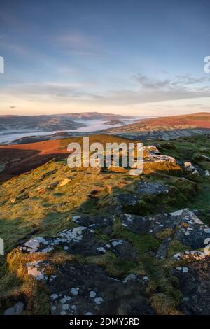 Looking west towards Pen-y-fan mountain from the top of the Sugar Loaf near Abergavenny. Stock Photo