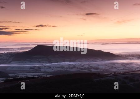Pre-dawn view of the Skirrid mountain from the top of Sugar Loaf. Stock Photo