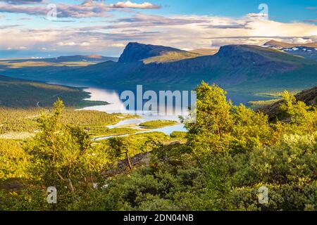 View over Stora sjöfallet nationalpark in the evening, mountains in background, nice evening light, Stora sjöfallet nationalpark, Swedish Lapland, Swe Stock Photo