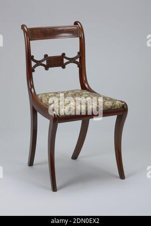Side chair, wood (mahogany, poplar), horse-hair upholstery, Back legs flat-sided, front legs flat excepting rounded front face; legs curve outward toward bottom, and back legs incline toward each other at bottom. Corner posts of back in a double curve terminating at top in an elementary volute form. Flat top rail bowed toward back, slightly arched, with a rectangular panel of inset veneer surrounded by beading. Splat horizontal, composed of small oblong carved with foliage, terminating in volutes. Seat flares from back to front with straight edges., New York, USA, ca. 1820, furniture Stock Photo