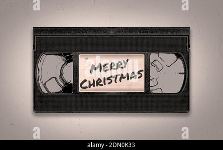 A retro MERRY CHRISTMAS old and distressed black VHS video tape illustration background with copy space Stock Photo