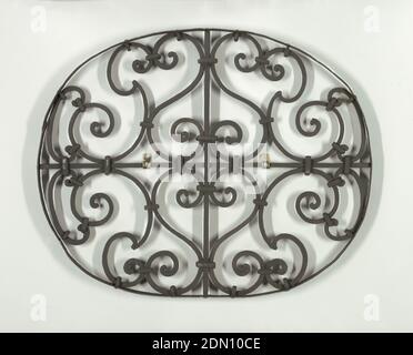 Grille, Wrought iron, Oval, for a small window. Scroll-work disposed about central vertical and horizontal axial rods., France, ca. 1650, metalwork, Decorative Arts, Grille Stock Photo