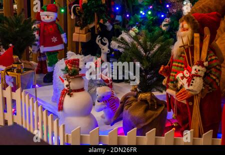 Composition with Christmas tree, Santa Claus, Snow Man and decorations Stock Photo