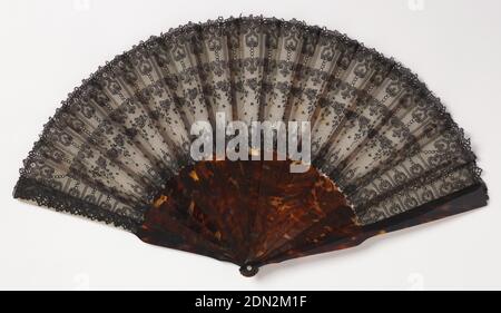 Pleated fan, Silk lace mounted on silk gauze leaf; tortoise shell sticks, Pleated fan with leaf of black Chantilly lace on white gauze. Sticks are plain tortoise shell., France, 1851–1900, costume & accessories, Pleated fan Stock Photo