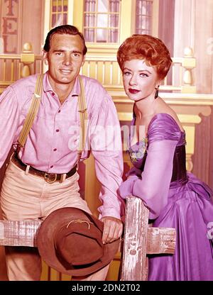 GUNSMOKE CBS TV series 1955-1975 with Amanda Blake as Miss Kitty Russell and Dennis Weaver as Chester Goode about 1967 Stock Photo