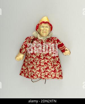 Puppet, Painted papier-mâché, woven cloth, Peaked “sugarloaf” hat, spotted with red brim. Shirt of cotton printed with a black foliate design against a red field, with white reserve. Blue ruff., Germany, late 19th century, theater, Decorative Arts, Puppet Stock Photo