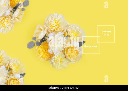 Festive flower composition on the yellow background. Overhead view Stock Photo