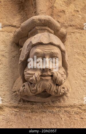 elements of architectural decorations of buildings, sculptures, mythological and religious characters on the streets in Catalonia, public places. Stock Photo