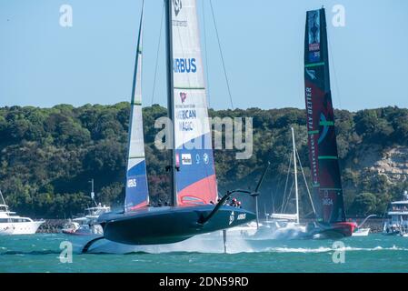 Emirates Team New Zealand chases American Magic in race four of the Regatta. PRADA America's Cup World Series Auckland Race Day One. 17/12/2020 Stock Photo