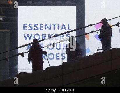 New York, United States. 17th Dec, 2020. Workers shovel the red steps in the early morning hours during a major snow storm in Times Square in New York City on Thursday, December 17, 2020. A winter storm nor'easter dumped snow in New York and the Northeast with totals in New York City totaling about 12 inches. Photo by John Angelillo/UPI Credit: UPI/Alamy Live News Stock Photo